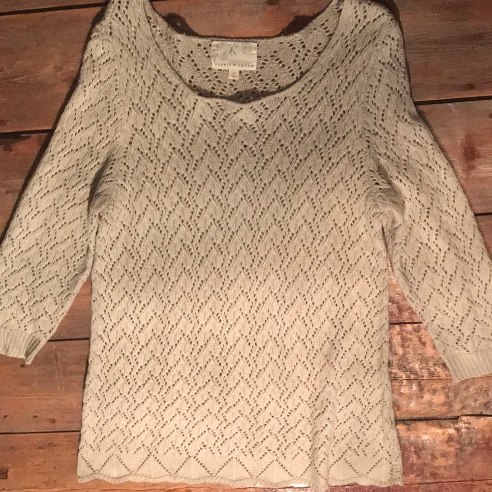 Beige eyelet tunic.